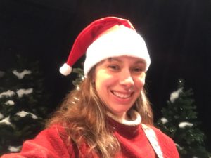 Marlene Hartzler in a santa hat